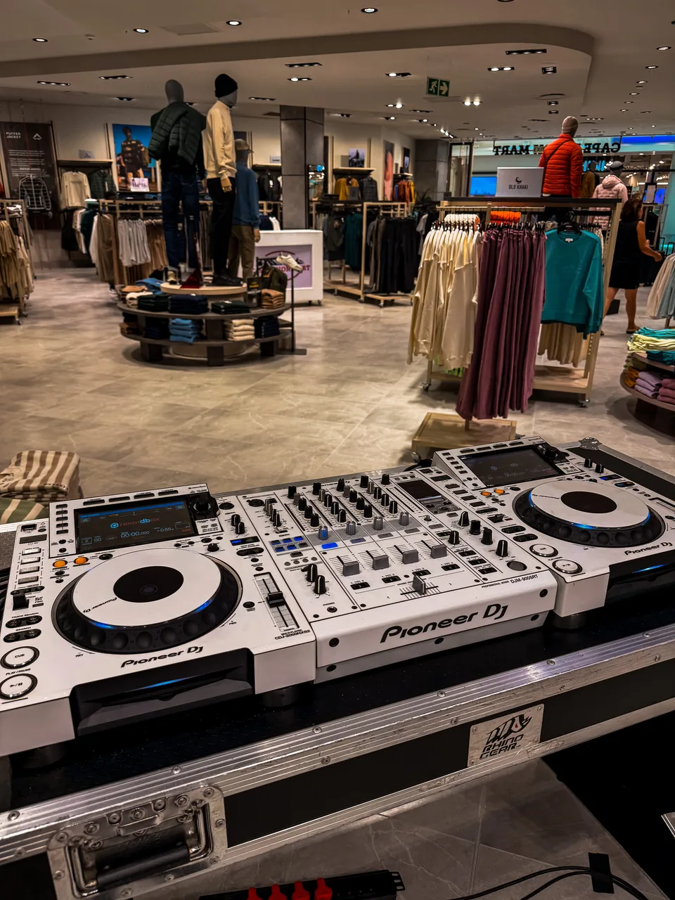 Professional DJ equipment set up for an in-store event