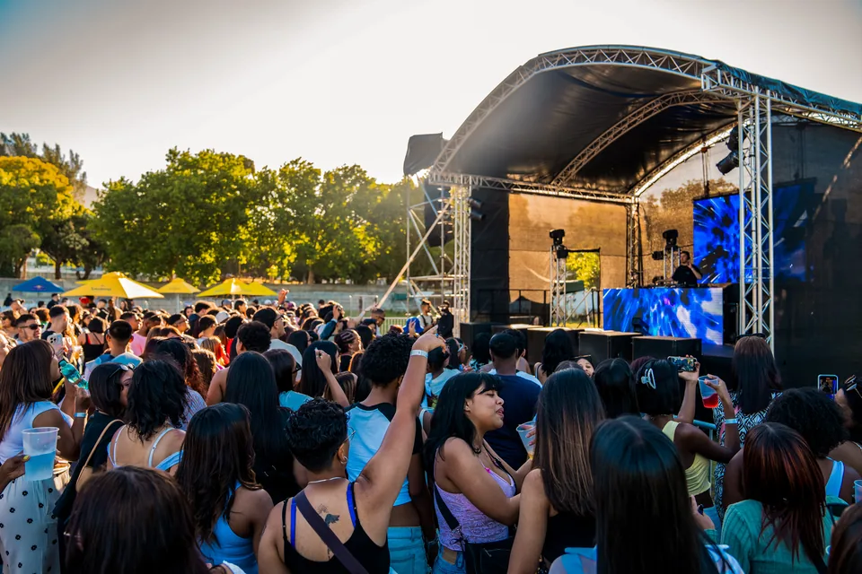 Outdoor event stage and audience with sound and lighting production